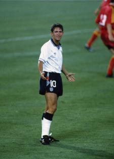 Gary Lineker, wearing an England soccer uniform, on a field.