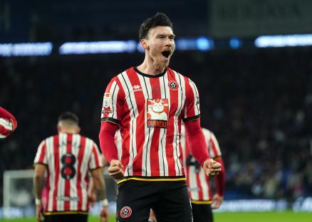 Kieffer Moore celebrating a goal.