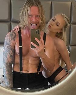 Mirror selfie of a man and woman.
