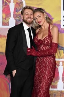 Sam Thompson and Zara McDermott at the BRIT Awards 2024.