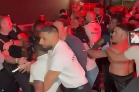 Chaos erupts as rappers Krept & Konan are hauled away by bouncers in shock footage of ‘brawl’ at Misfits Boxing match