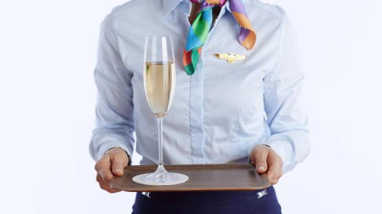 Major airline apologises after serving WINE on a flight to boy, 3, in business class