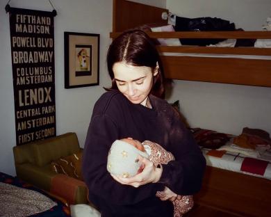 Lily Collins holding her baby girl, Tove.