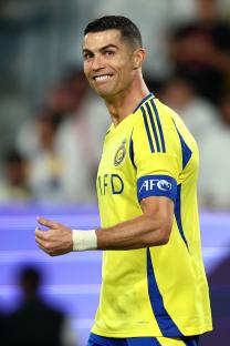 Cristiano Ronaldo of Al-Nassr reacting during a soccer match.