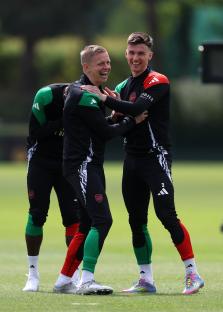 Oleksandr Zinchenko and Kieran Tierney of Arsenal at a training session.