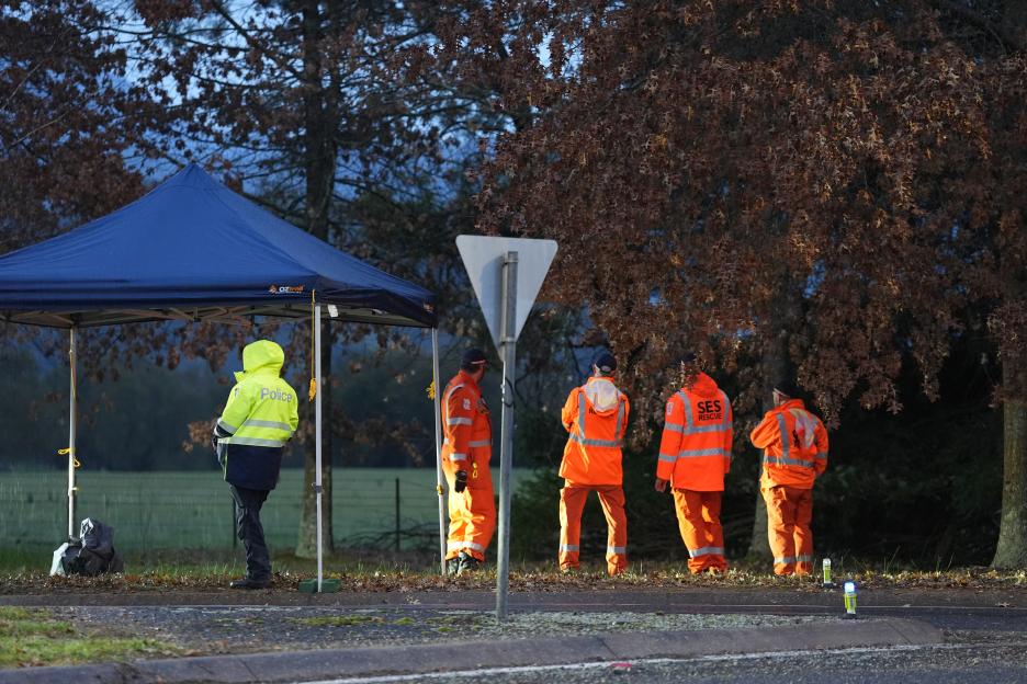 Police and emergency personnel at a crime scene.