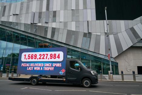 Domino's pizza truck displaying the number of pizzas delivered since the Spurs last won a trophy.