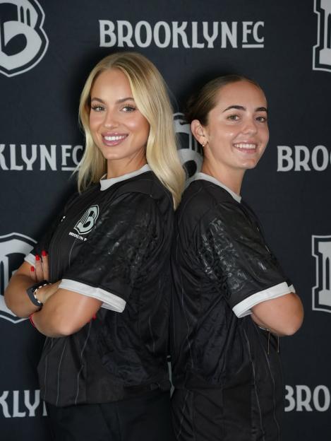 Ana Maria Markovic and her sister in Brooklyn FC jerseys.
