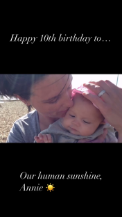 Happy 10th birthday to Annie, our human sunshine. Photo of a woman kissing a baby.