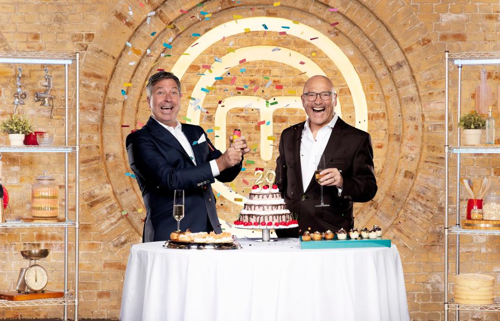 MasterChef presenters John Torode and Gregg Wallace celebrating the show's 20th series.