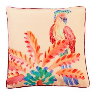 Cushion with parrot and tropical plants illustration.