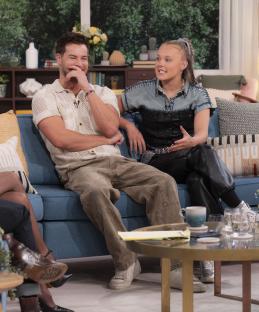 Chris Hughes and JoJo Siwa on a TV show.