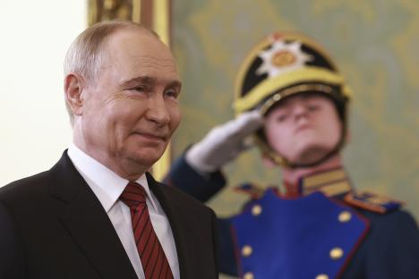 Vladimir Putin at a meeting in the Kremlin.