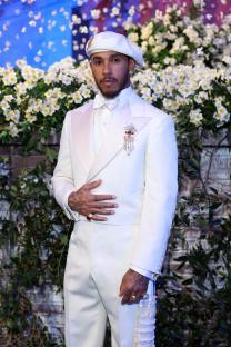 Lewis Hamilton at the Met Gala in a white suit.