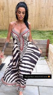 Woman in zebra-print maxi dress.