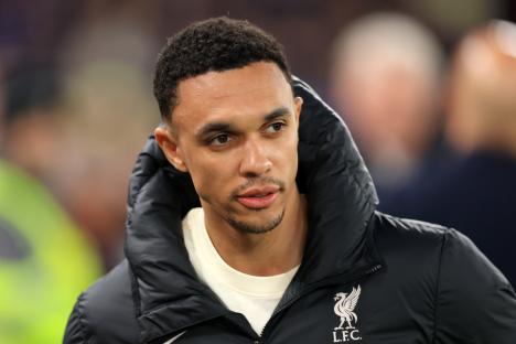 Trent Alexander-Arnold of Liverpool looks on.