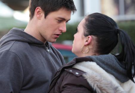 Whitney Dean and Tyler Moon in a tense scene.