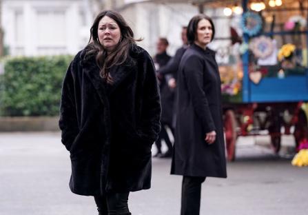 Stacey Slater and Eve Unwin, actors from EastEnders, walking in the street.