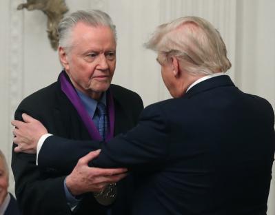President Trump presenting Jon Voight with the National Medal of Arts.