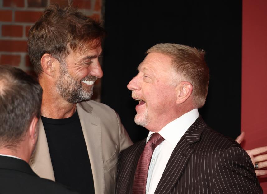 Jürgen Klopp and Boris Becker at an awards ceremony.