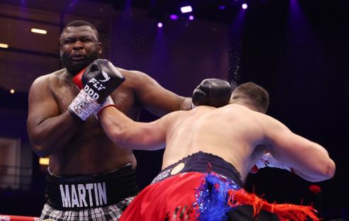 RIYADH, SAUDI ARABIA - FEBRUARY 22: Joseph Parker punches Martin Bakole during the WBO Interim World Heavyweight title fight between Martin Bakole and Joseph Parker as part of Beterbiev v Bivol 2: The Last Crescendo at Kingdom Arena on February 22, 2025 in Riyadh, Saudi Arabia. (Photo by Richard Pelham/Getty Images)