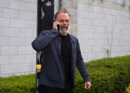Man on a phone call.
