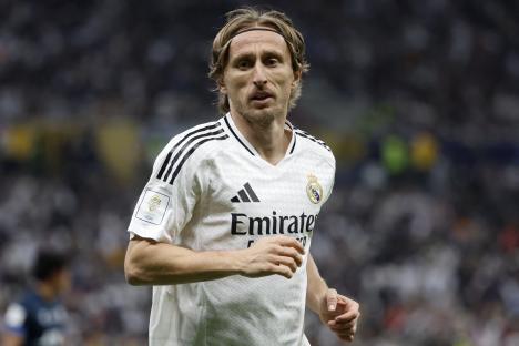Luka Modric in Real Madrid uniform during a soccer match.