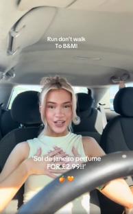 Woman in car recommending a £2.99 perfume dupe.