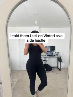 Woman in black leggings reflected in a mirror, text overlay says she sells on Vinted as a side hustle.