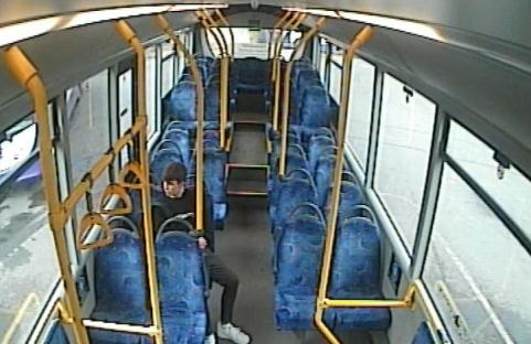 Surveillance image of a teenager on a bus.