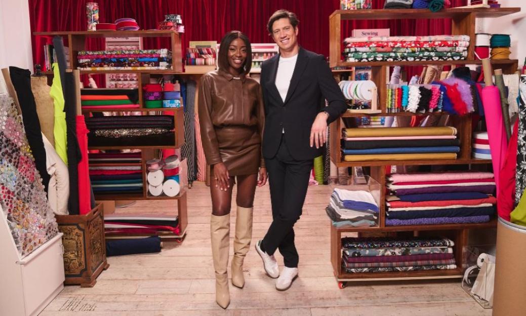 a man and a woman standing in front of a shelf that says sewing