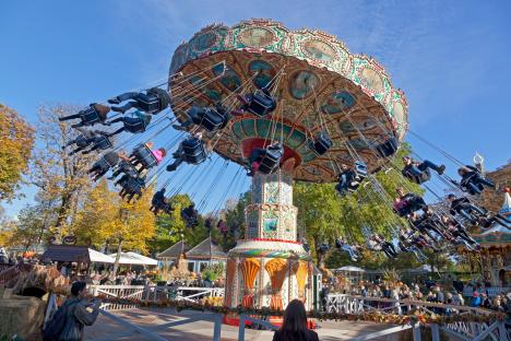 A swing carousel ride at Tivoli Gardens during a Halloween event.