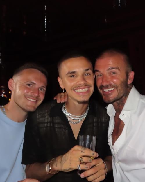 Mitchell Curry with David and Romeo Beckham.