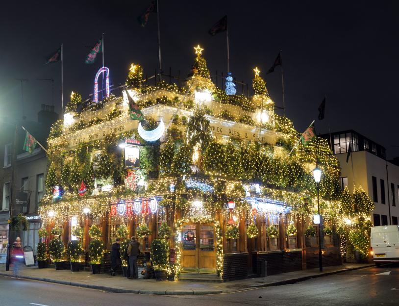 Step Inside the UK's Most Festive Pub: A Cozy Inn Decked Out with 22,000 Lights and 80 Christmas Trees!