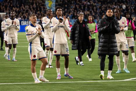 Chelsea players thanking supporters after a match.