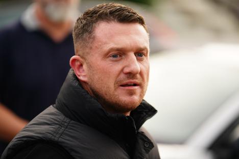 Tommy Robinson charged with harassing two men last year – hours after judge agreed to release him from jail early