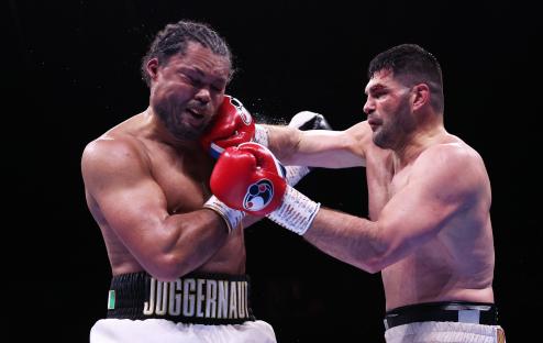 Filip Hrgovic punches Joe Joyce in a boxing match.
