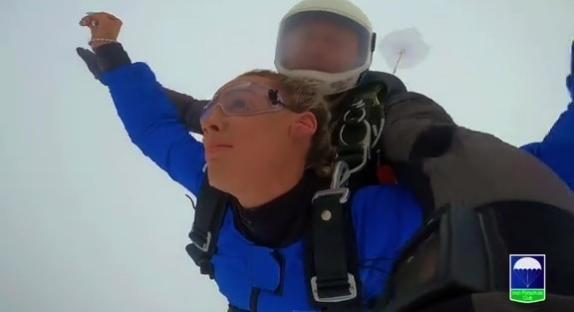 Skydiver's POV of tangled parachute during jump.