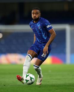 Christopher Nkunku of Chelsea FC dribbling the ball.