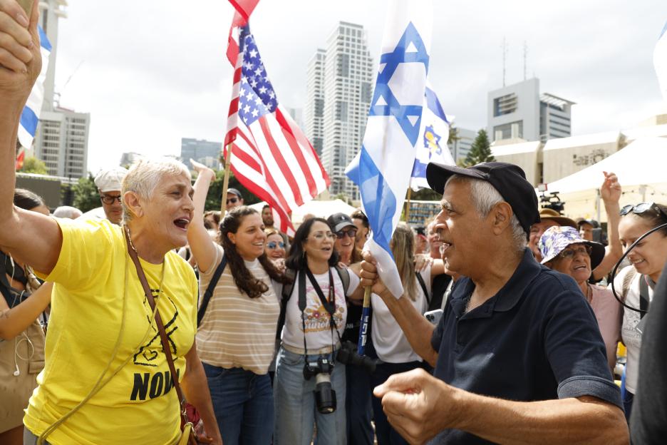 Joyful Celebrations Erupt in Tel Aviv’s Hostage Square Following Israel-Hamas Peace Deal, Filled with US Flags and 'I Love Trump' Banners