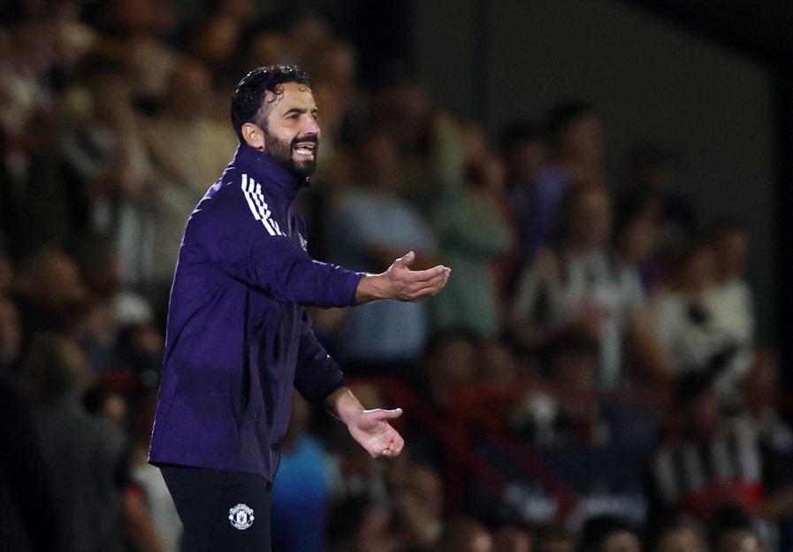 Ruben Amorim, Manchester United manager, coaching during a soccer match.